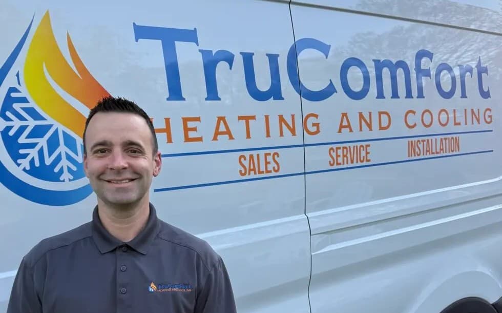 TruComfort owner standing next to service van